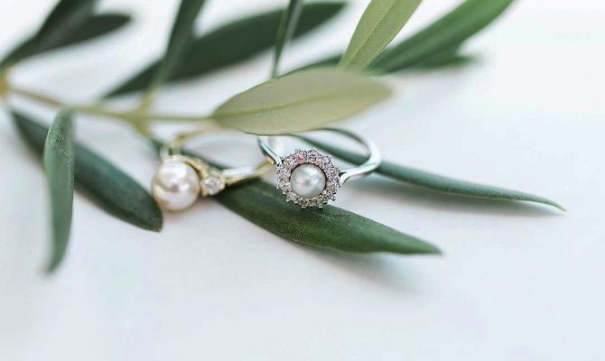 pearl engagement rings white gold floral halo