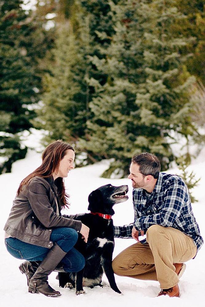winter engagement photos couple engaged cute dog