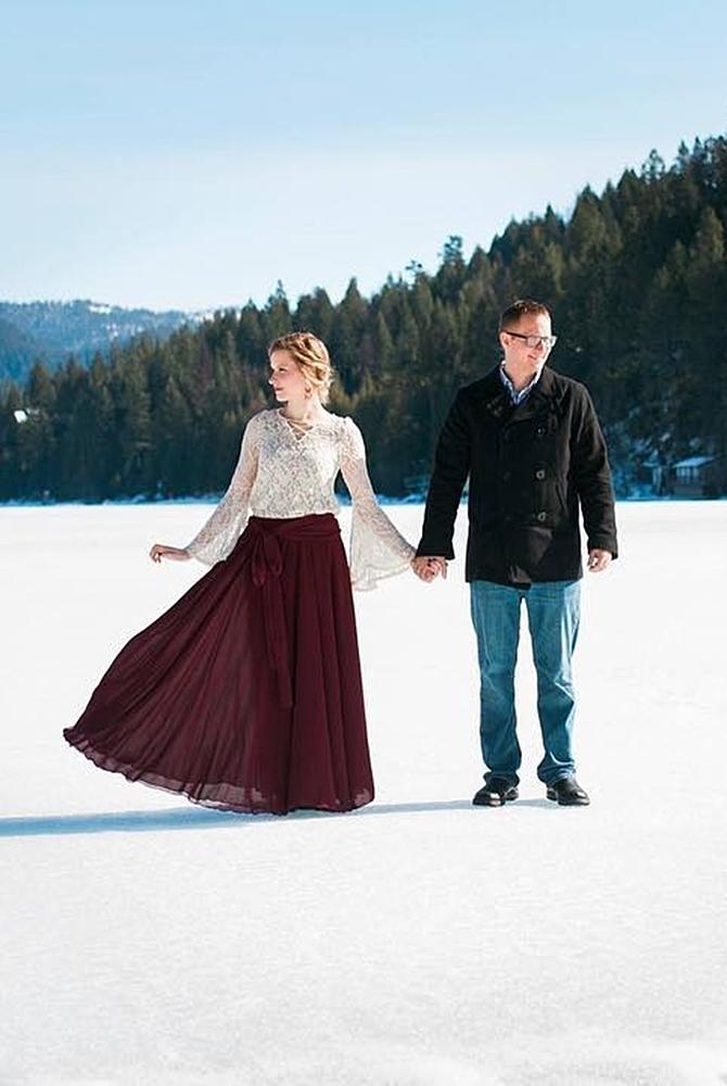 winter engagement photos couple photo with fantastic backdrop