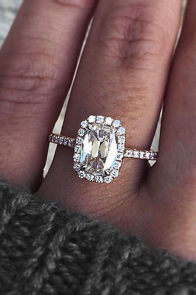 engagement ring designers emerald cut diamond pave band halo