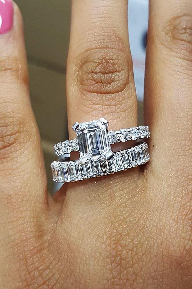 engagement ring designers emerald cut white gold diamond