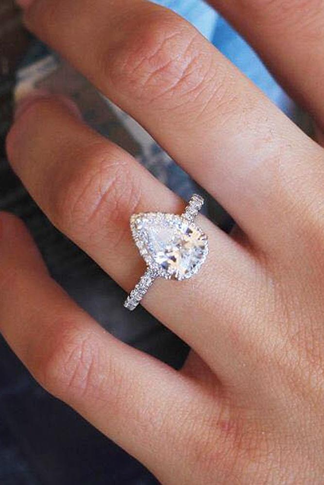 halo engagement rings pear cut diamond pave band