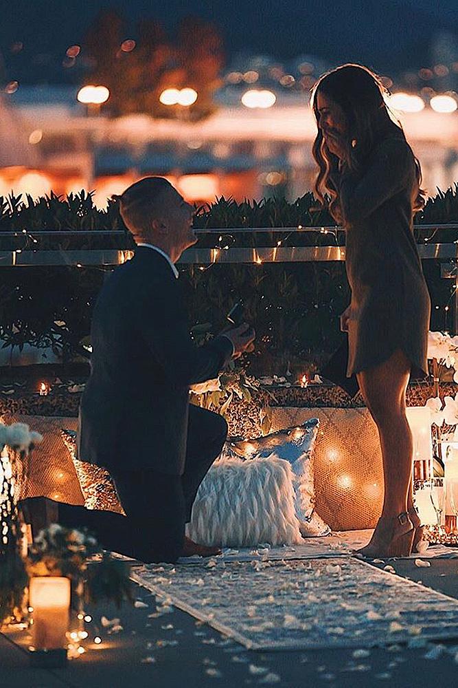 unique proposal ideas man propose woman with candles