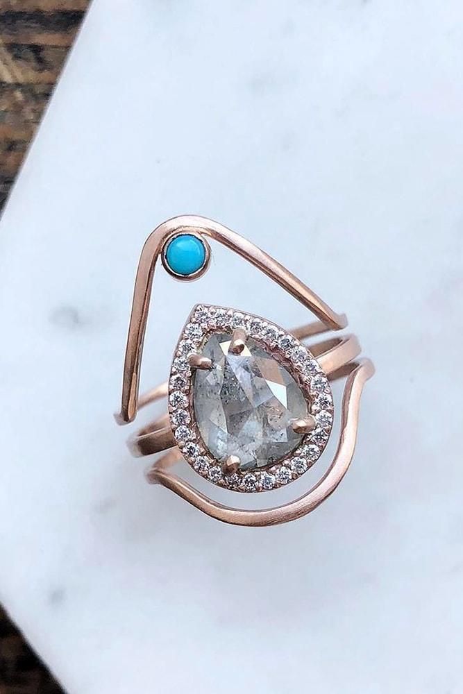 rose gold engagement rings modern ring pear cut gemstone halo unique design