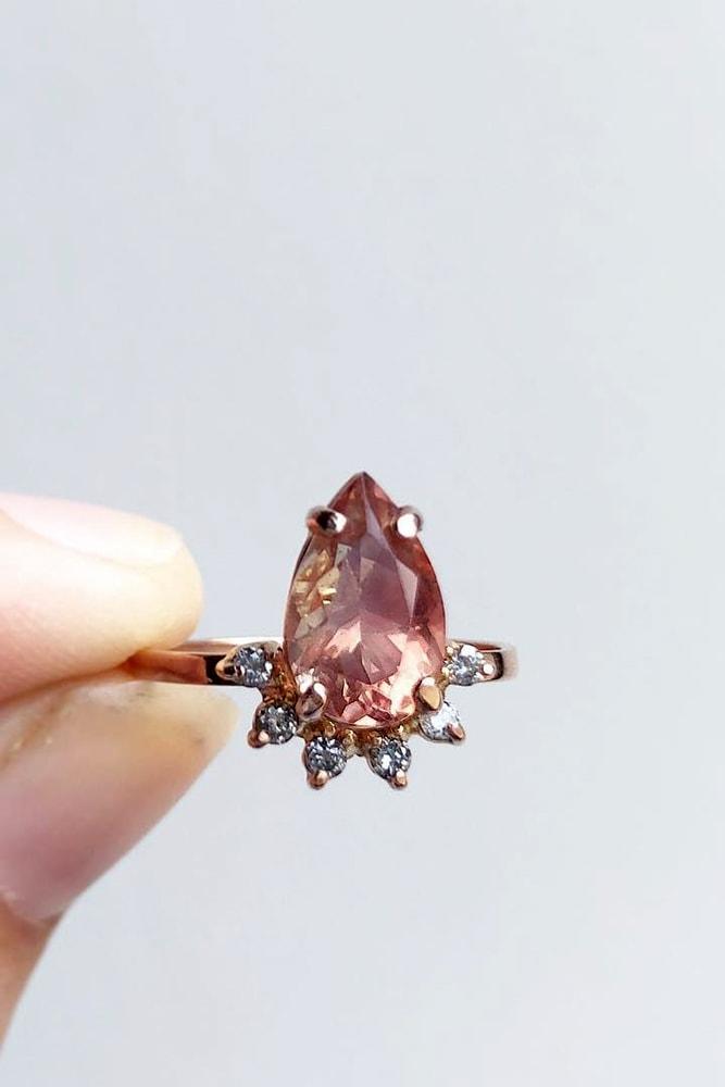 rose gold engagement rings modern ring pear cut gemstone rose gold