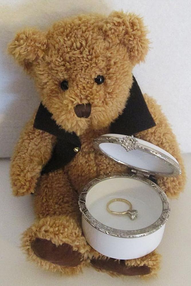 engagement photos teddy bear yellow gold ring simple solitaire diamoind