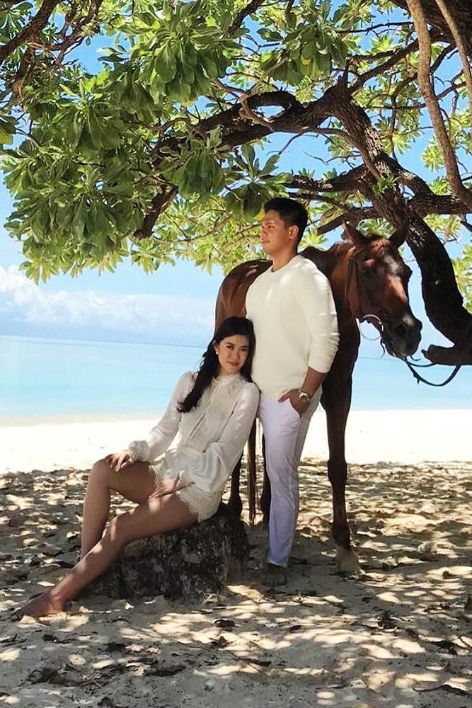 engagement pictures cute photo on the beach with a horse