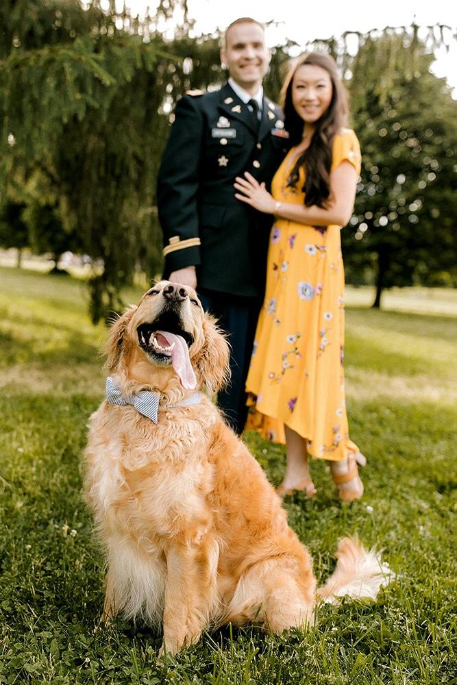 engagement pictures with a dog in the park engagement photo