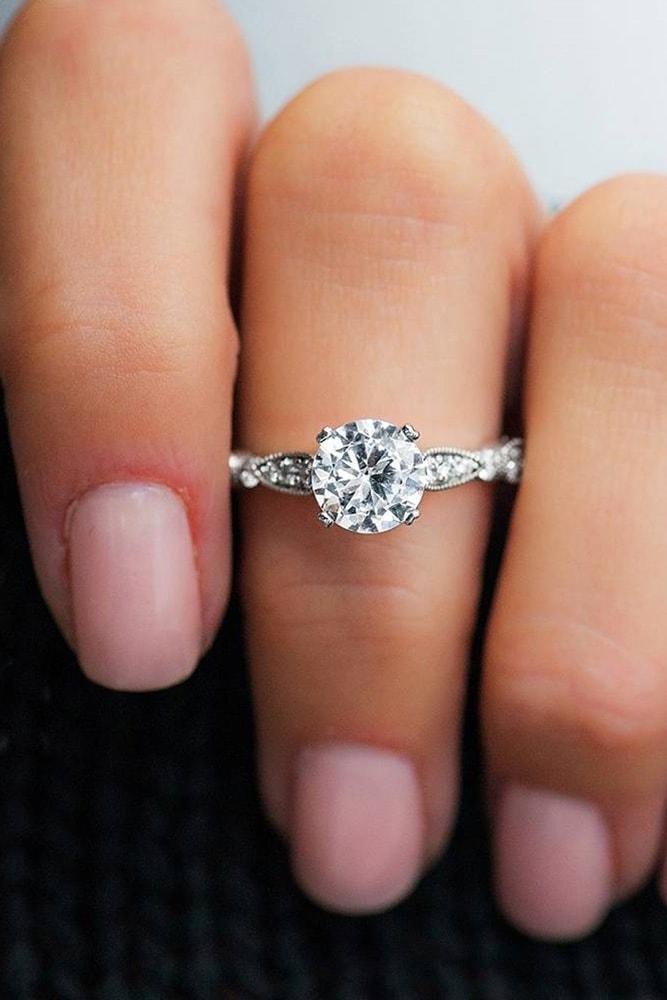 white gold engagement ring round cut diamond solitaire pave band unique details