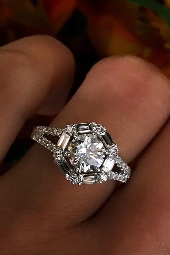 white gold engagement rings modern ring round cut diamond in centre halo with emerald cut and round cut diamonds split shank
