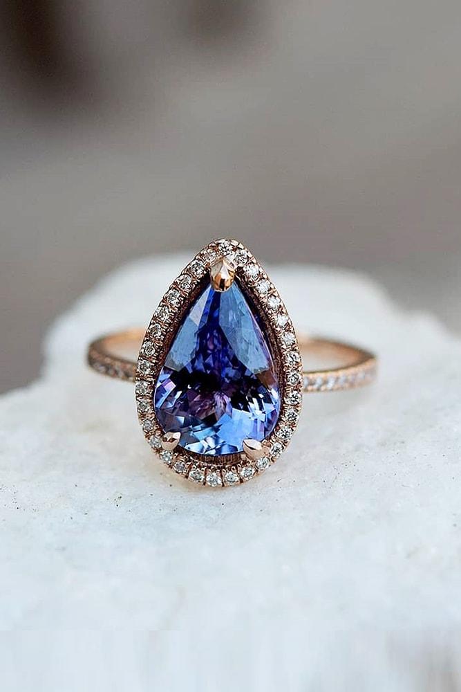 ring trends gemstone engagement rings rose gold pear cut blue sapphire halo