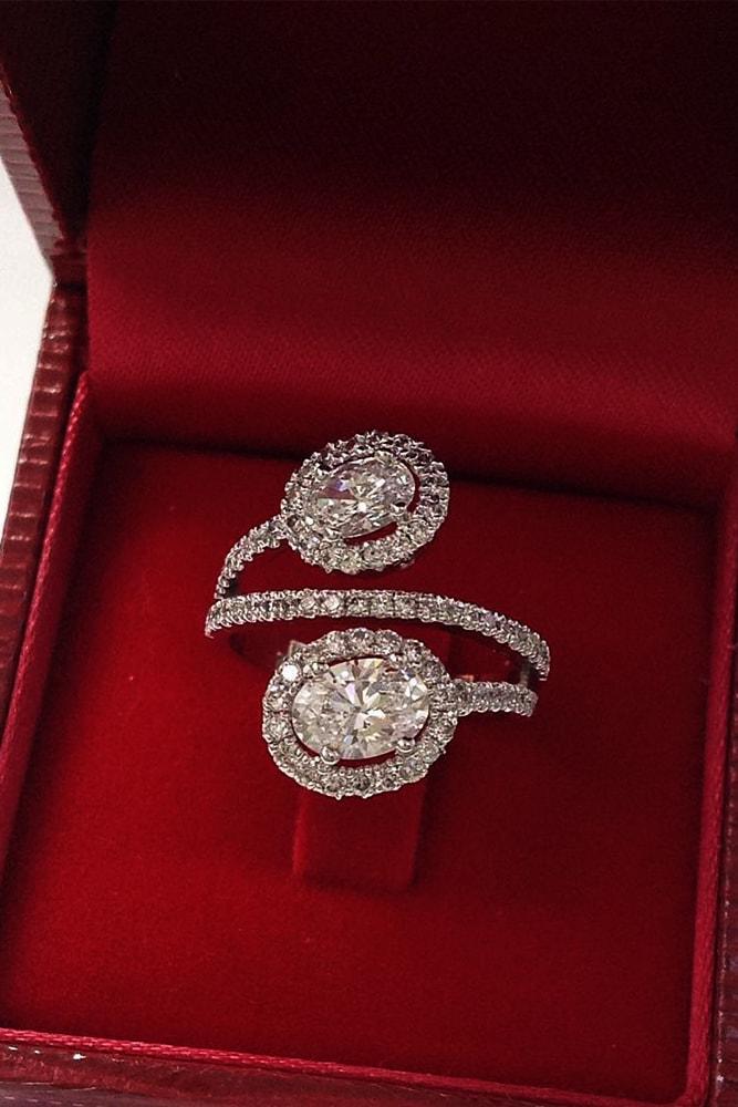 ring trends oval cut center diamond halo white gold unique design
