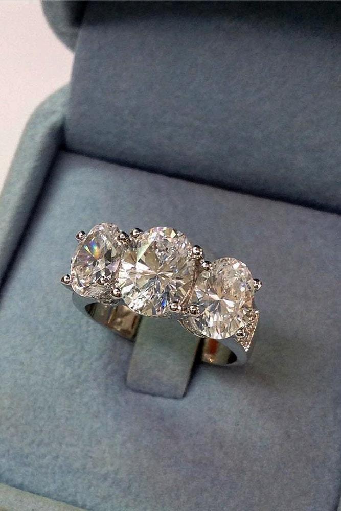 ring trends white gold oval cut center three diamonds sparkling