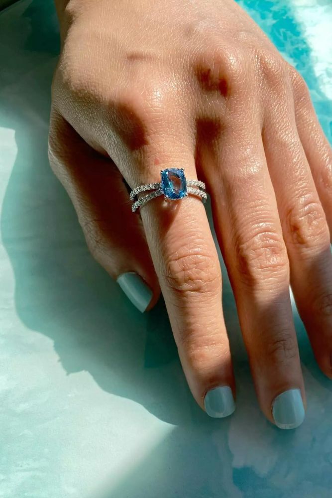 modern engagement rings with blue gemstones