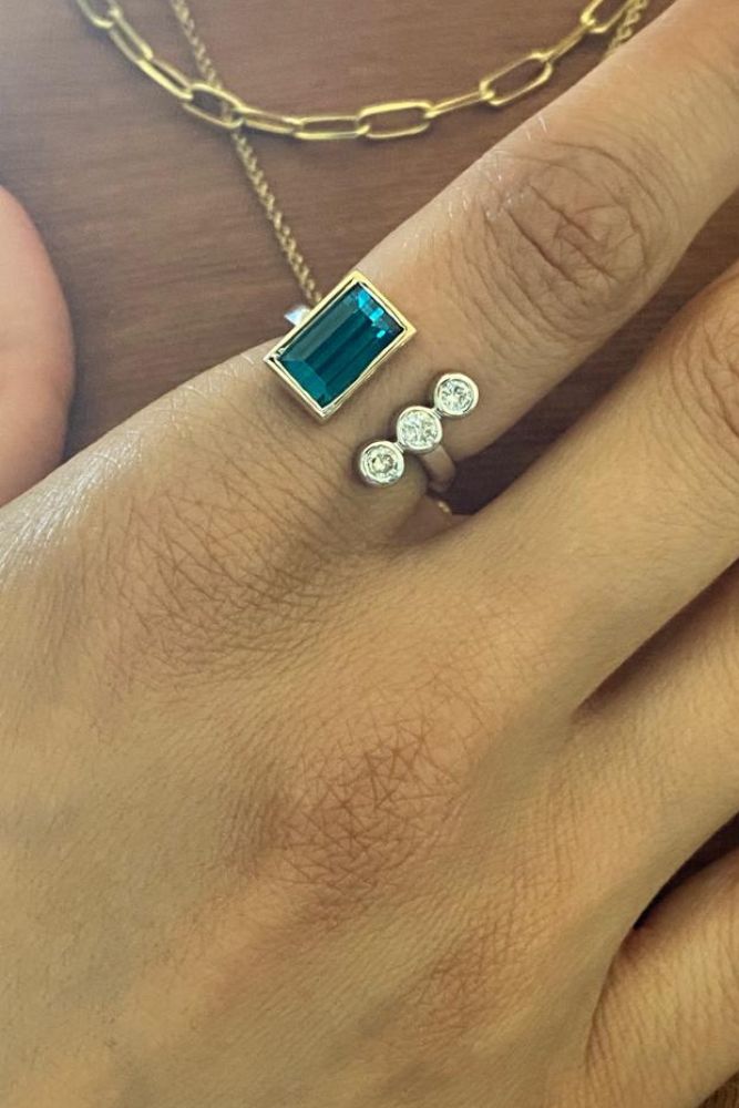 modern engagement rings with blue gemstones