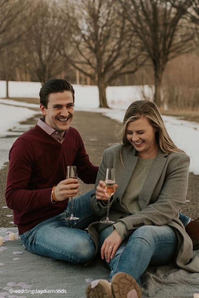 new year engagement photos a couple celebrating new year after engagement in nature with shampagne weddingdaydiamonds (2)