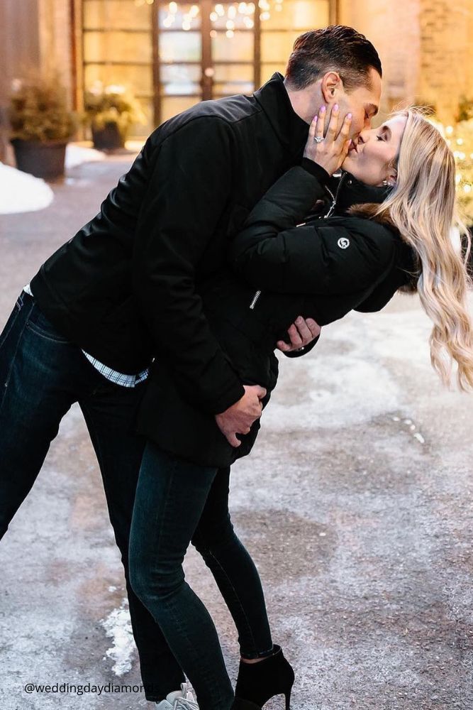 new year engagement photos couple kissing in the city after engagement weddingdaydiamonds