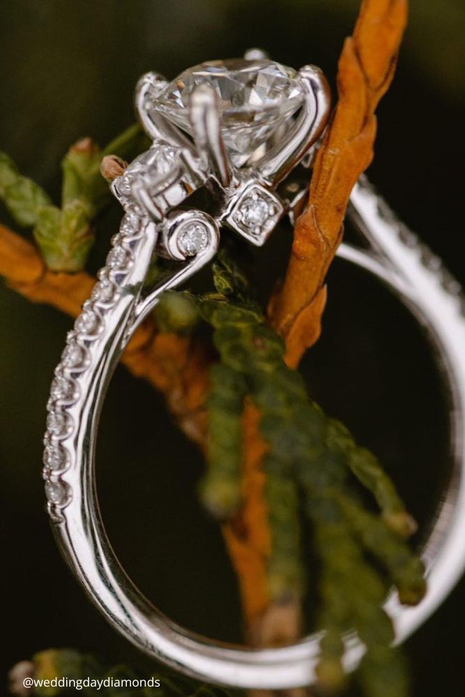 new year engagement photos engagement ring sitting on top of a tree branch weddingdaydiamonds