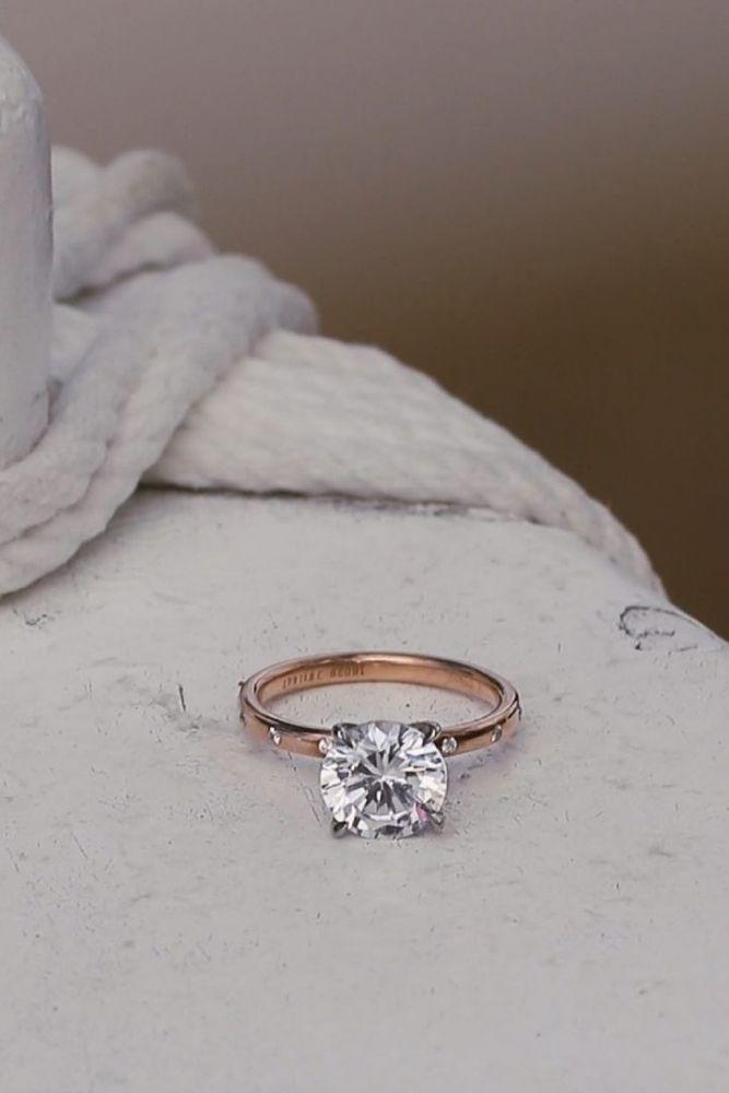 rose gold solitaire ring with solitaire diamonds