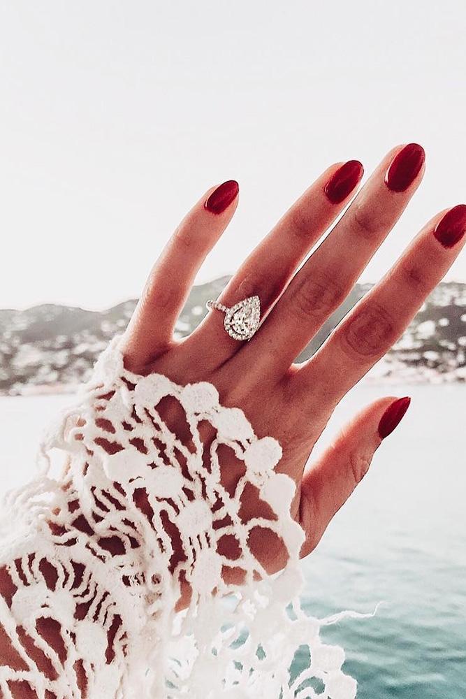 white gold engagement rings pear cut engagement rings diamond engagement rings halo engagement rings