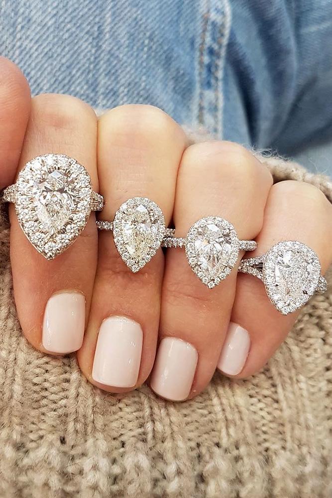 white gold engagement rings pear cut engagement rings diamond engagement rings halo engagement rings