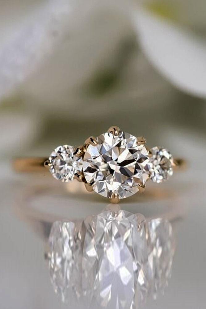 rose gold engagement rings diamond engagement rings three stone engagement rings round cut engagement rings