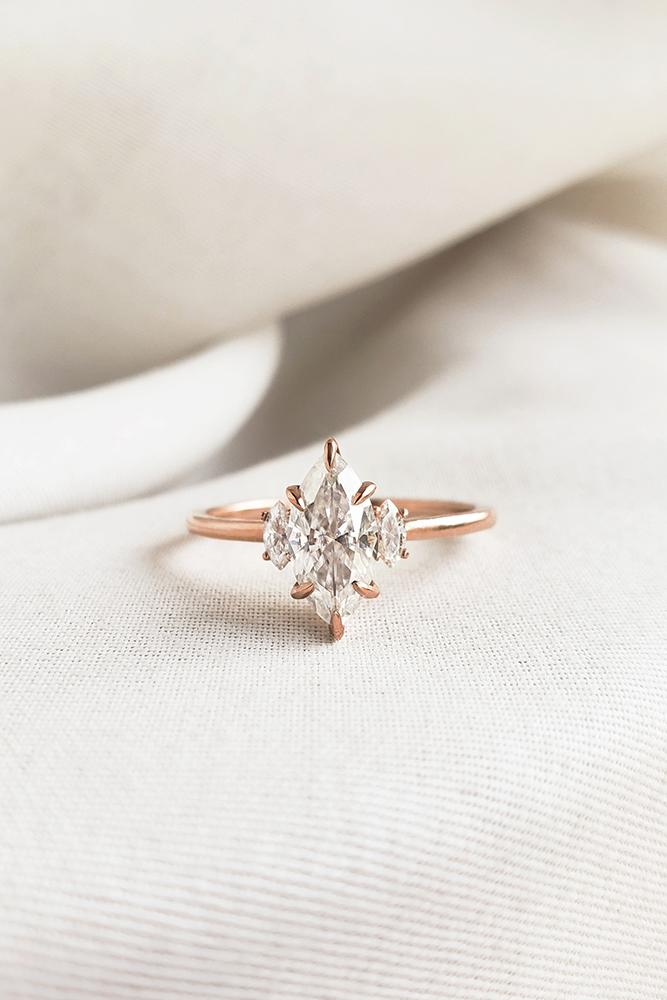 marquise diamond rose gold engagement ring three stone ring moissanite