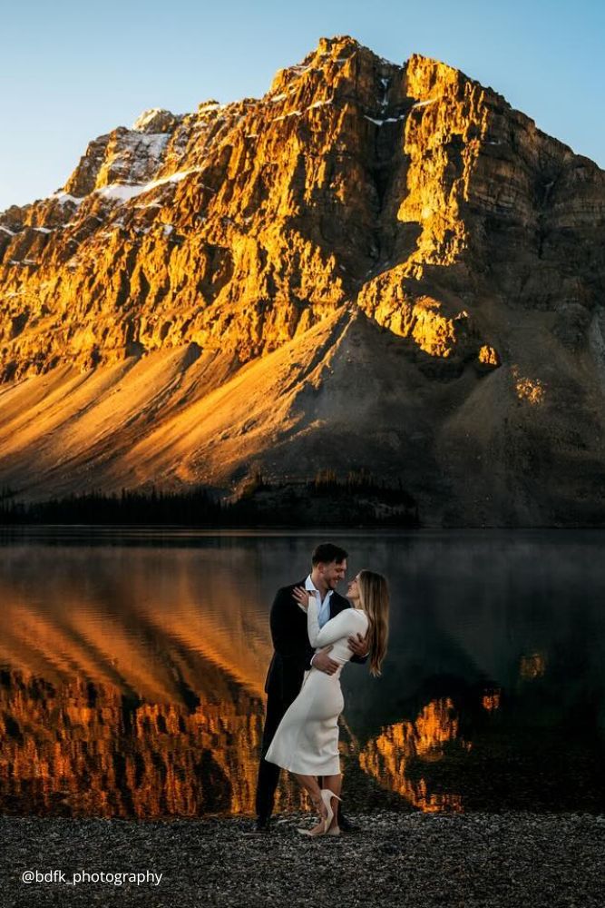 winter engagement photos snowy mountains on background couple engagement bdfk photography