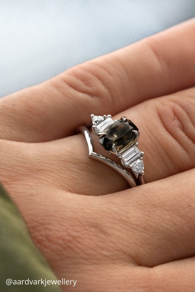 white gold engagement rings dark gemstone engagement and contoured chevron wedding ring set in white gold aardvarkjewellery