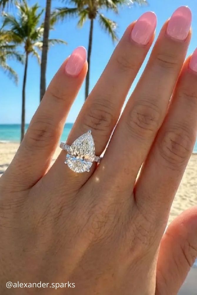 white gold engagement rings pear cut diamond engagement ring with pave band crafted in white gold alexander.sparks