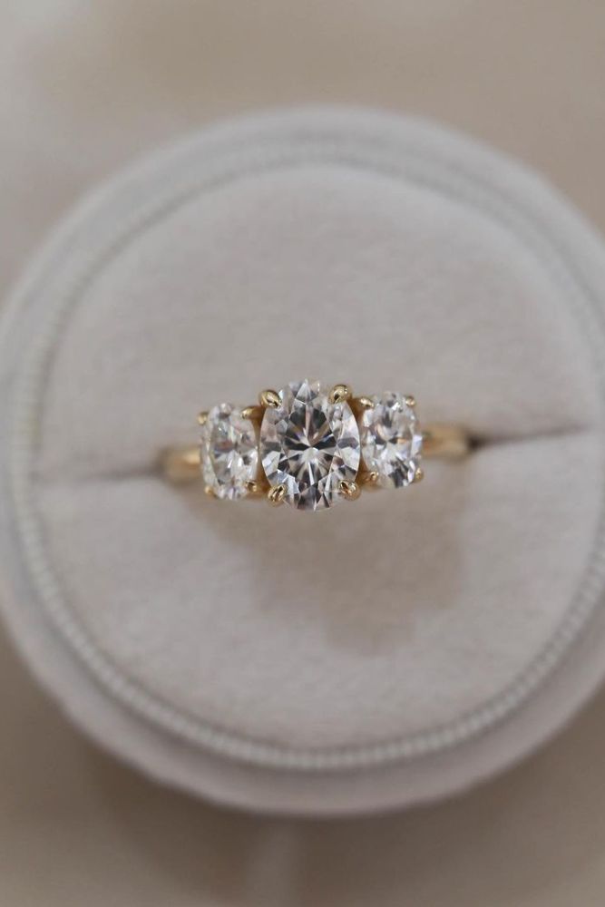 oval engagement rings three stone rings1