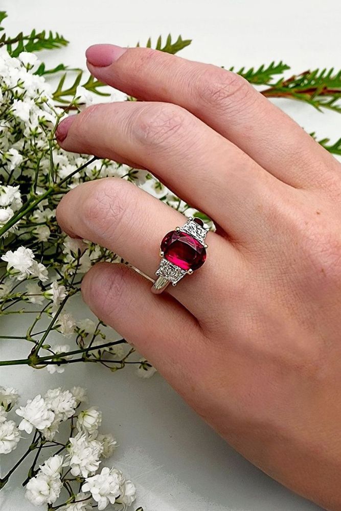 oval engagement rings with colored gemstones