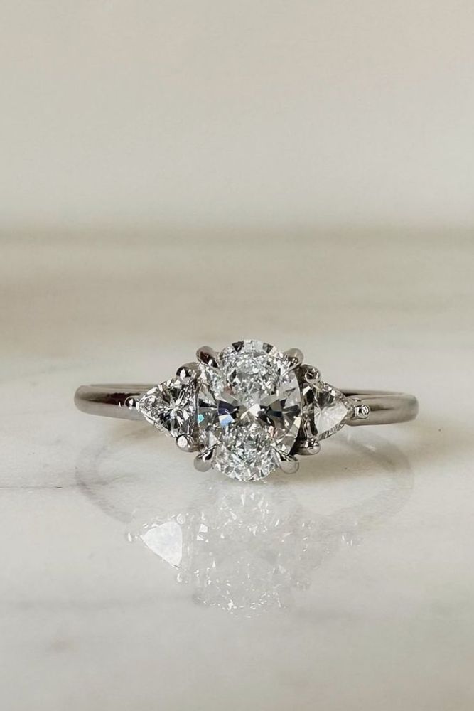 oval engagement rings with unique elements