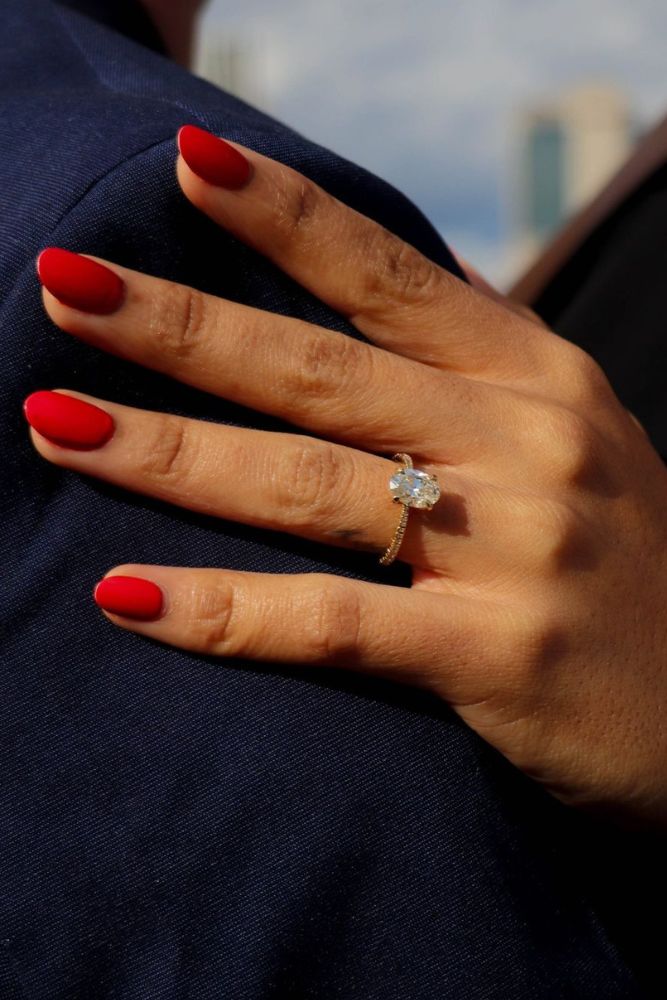 oval engagement rings with unique elements