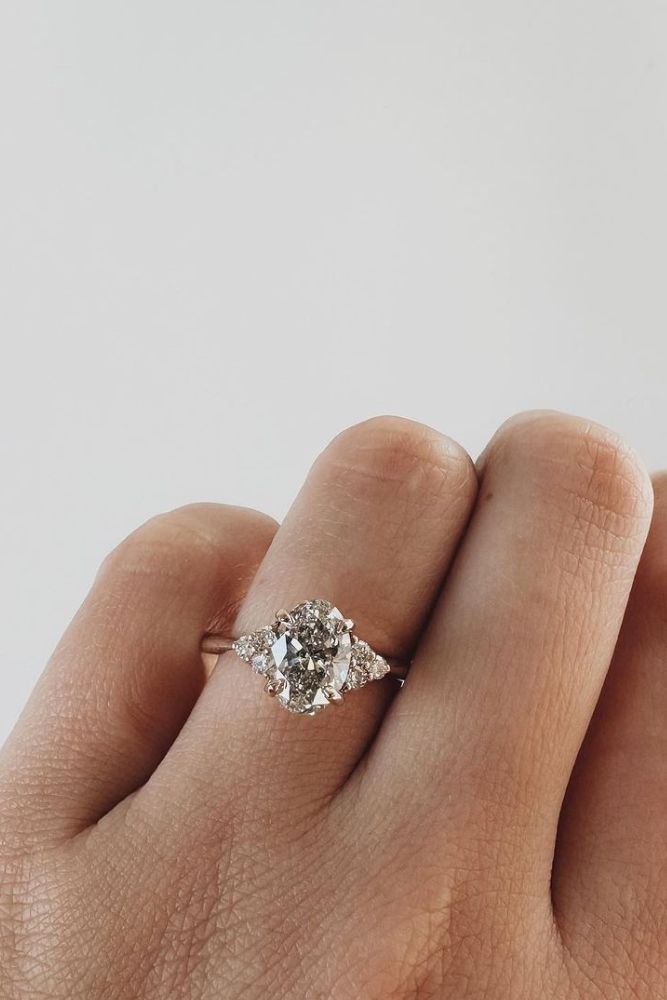 oval engagement rings with unique elements rings