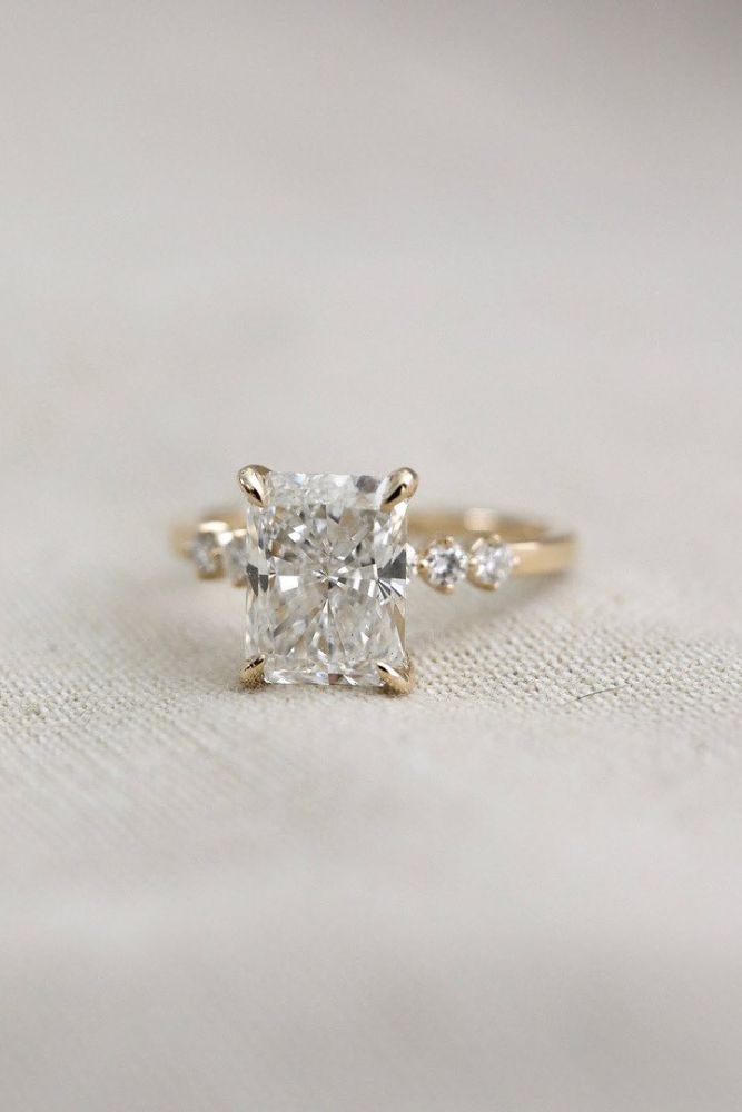 simple engagement rings emerald cut diamond rings2