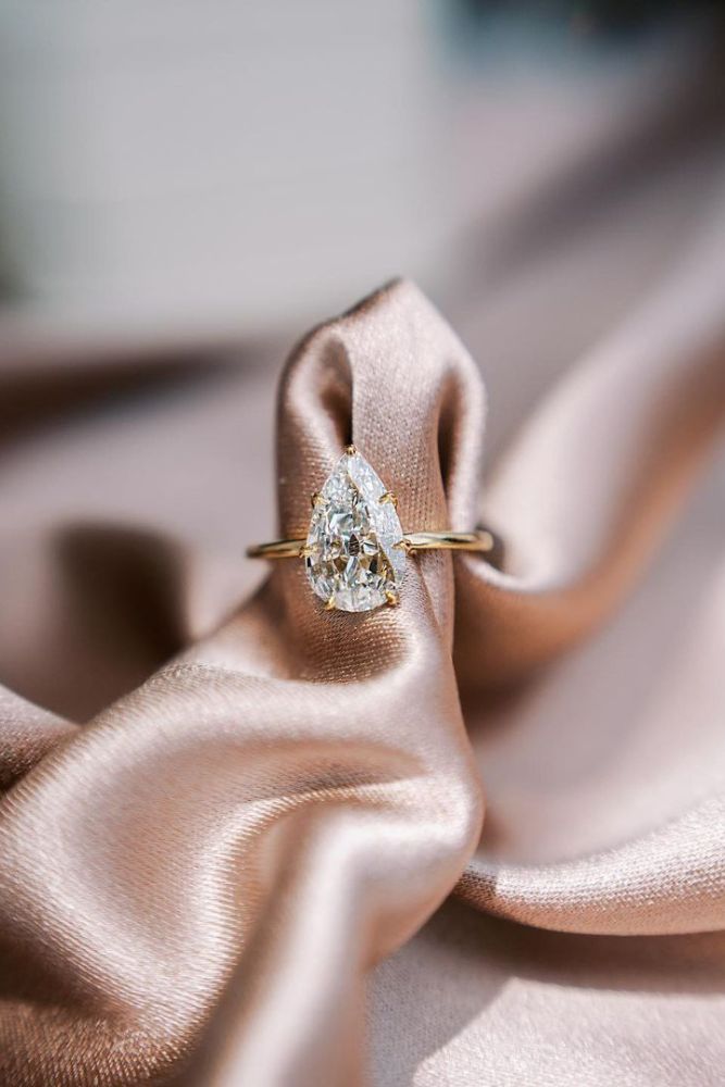 simple engagement rings pear shaped rings2