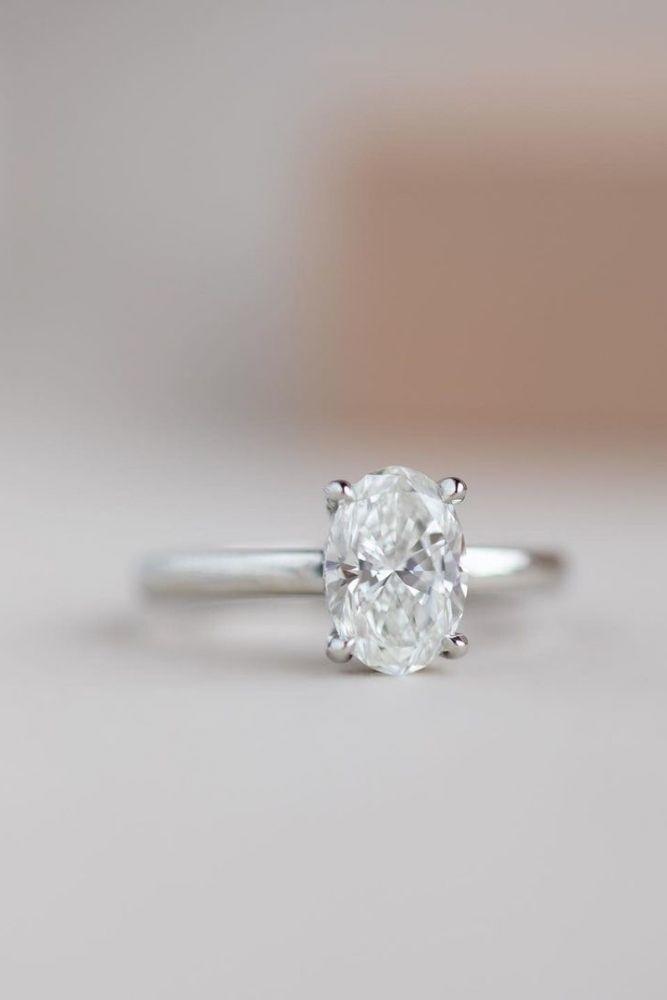 simple engagement rings with oval center stone2