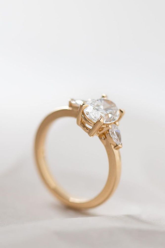 simple engagement rings with oval center stone2