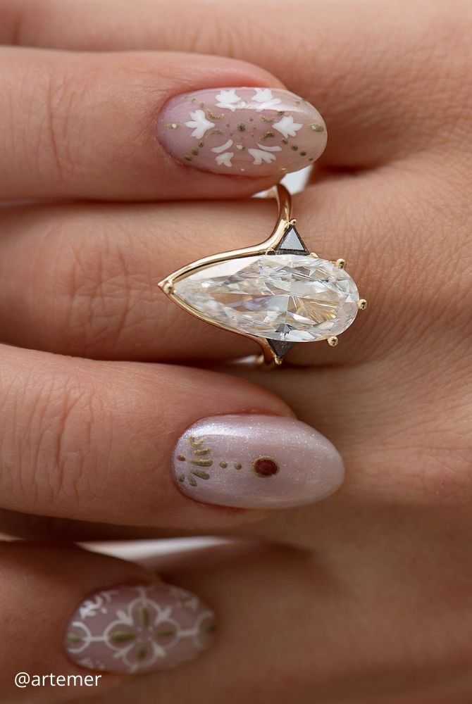 unique engagement rings large pear cut moissanite solitaire engagement ring in yellow gold artemer