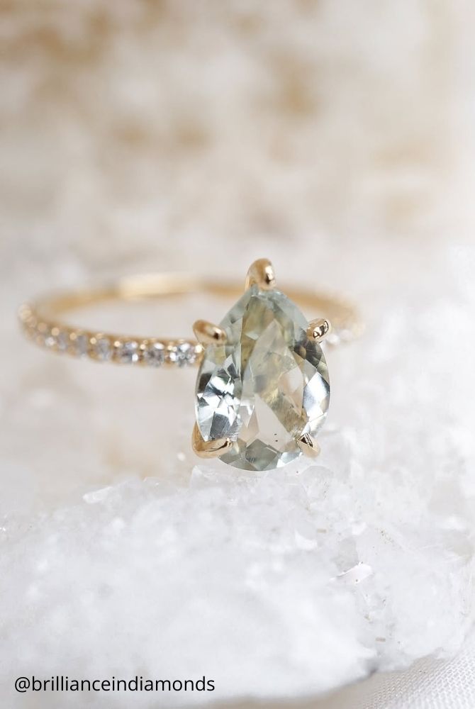 unique engagement rings pear cut light green gemstone yellow gold solitaire setting pavé band brillianceindiamonds