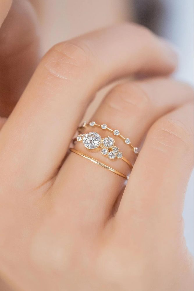 unique engagement rings with round centre stone