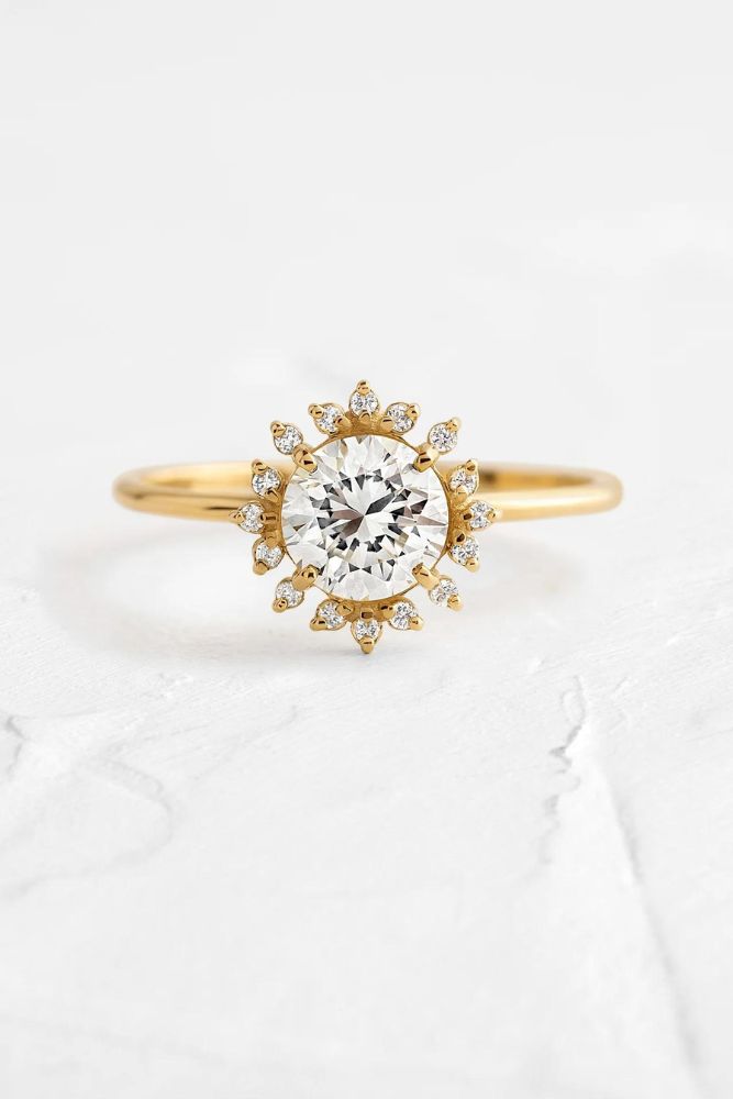 unique engagement rings with round centre stone