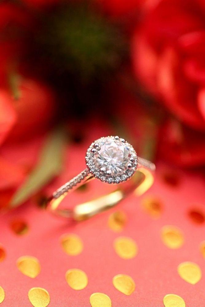 unique engagement rings with round cut centre stone
