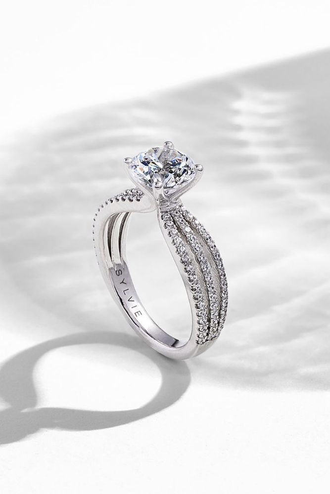 unique engagement rings with round cut centre stone