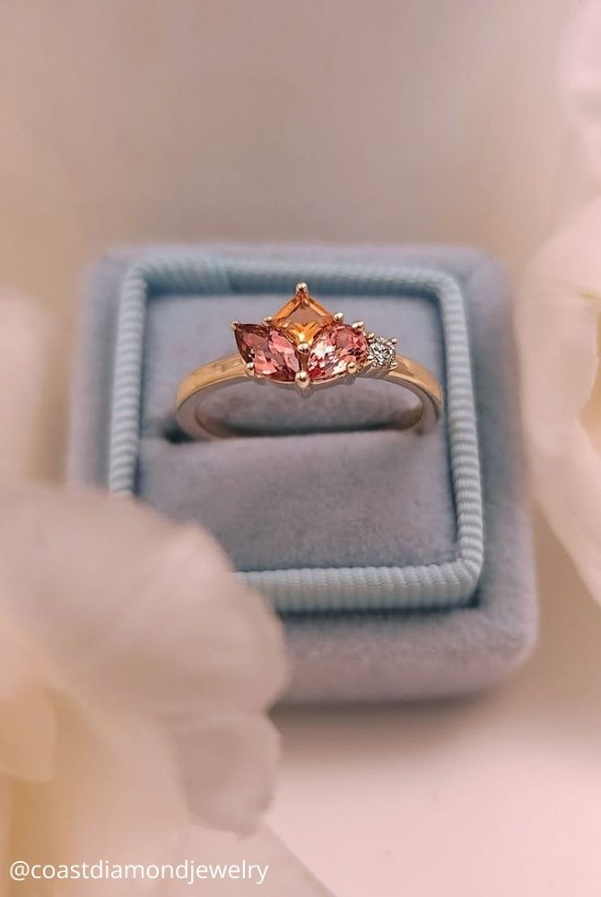 unique engagement rings yellow gold stone pink flower shape coastdiamondjewelry