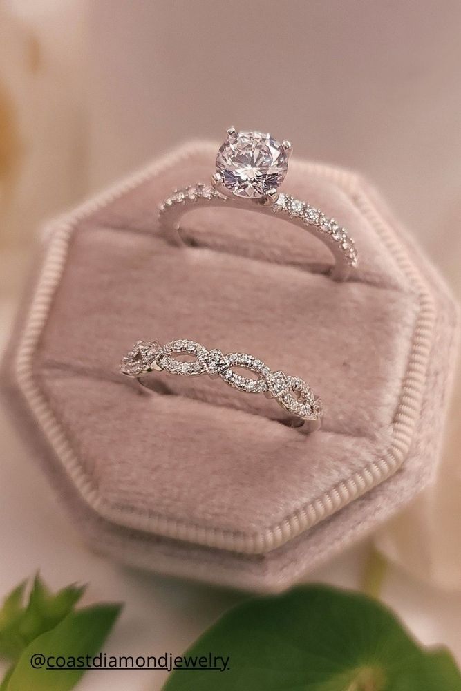 diamond wedding rings two rings with diamonds in a box coastdiamondjewelry