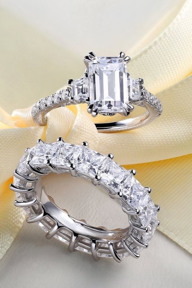 diamond wedding rings with emerald center stone