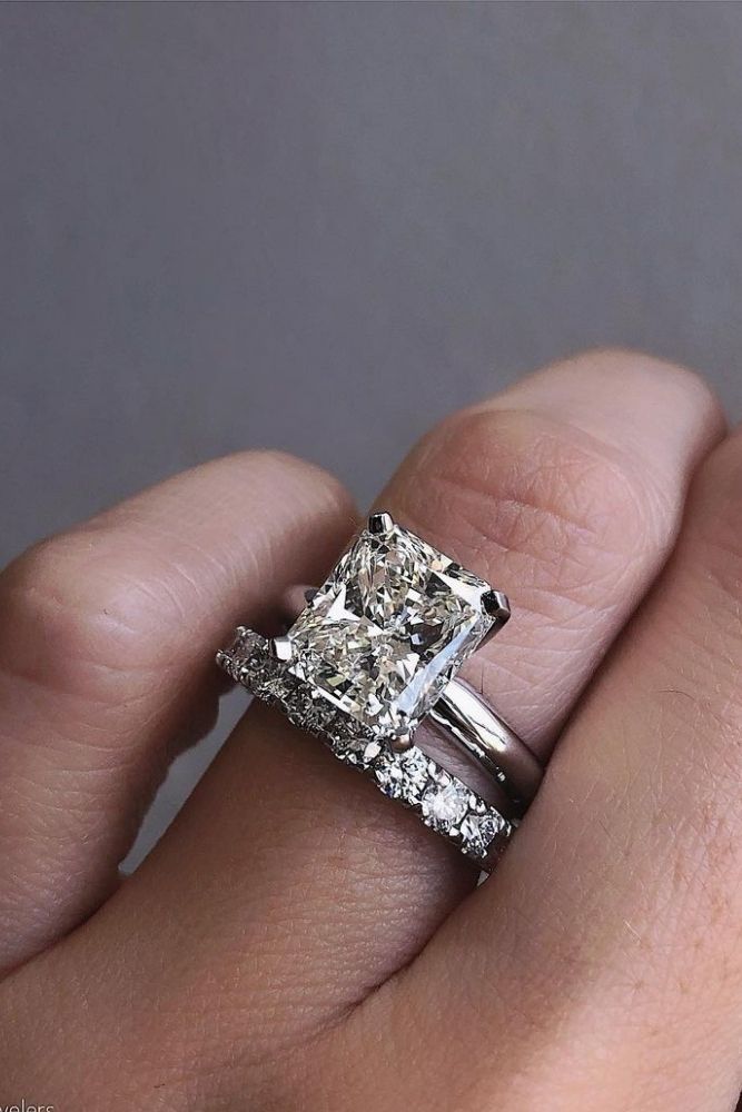 diamond wedding rings with emerald center stone