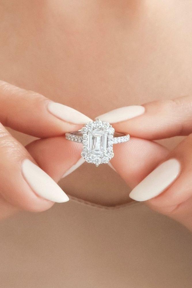diamond wedding rings with emerald cut center stone2